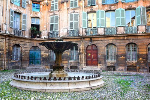 Fountain in a courtyard in Aix-en-Provence Fountain in a courtyard in Aix-en-Provence