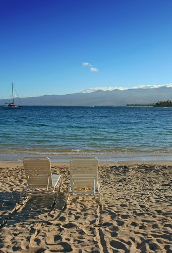 Beach chairs on the sand in chairs on beach. Beach chairs on the sand in