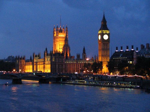 london england at night. The River Thames at night in