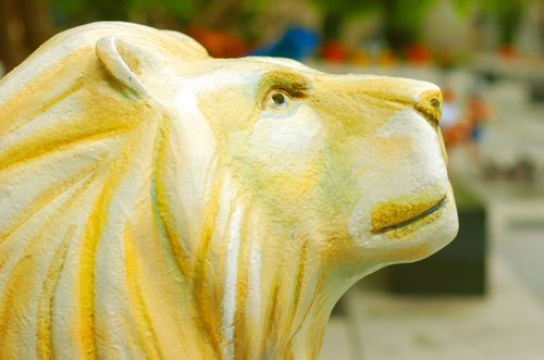 Carved lion on display at Boat Quay. More Boat Quay information