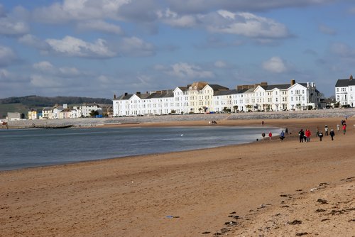 people walking on beach. People walking the each at