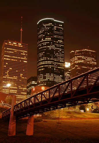 Bridge and Houston skyline at night.