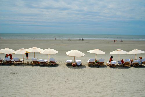 Beach umbrellas at Kiawah. Kiawah Island Golf Resort information