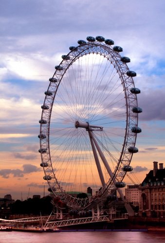 london eye. London Eye at sunset in London