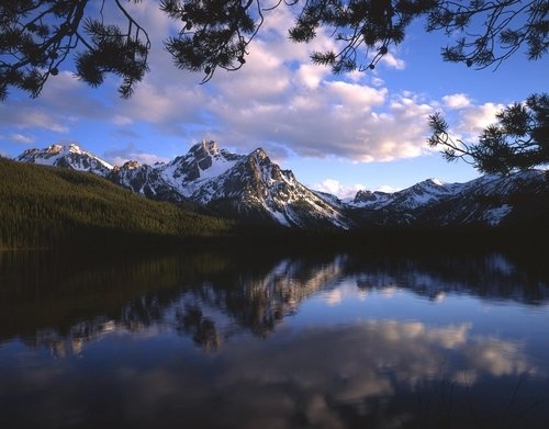 Mt. McGown reflecting in a lake in Sawtooth National Forest.