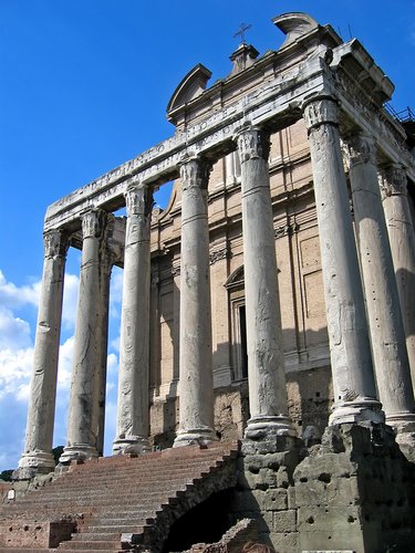 Temple of Antoninus and Faustina (141 AD) contains church San Lorenzo in Miranda, Forum of Rome.