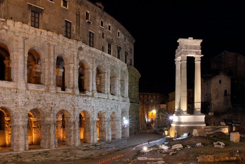 Temple of Apollo beside the Teatro di Marcello at night in Rome.