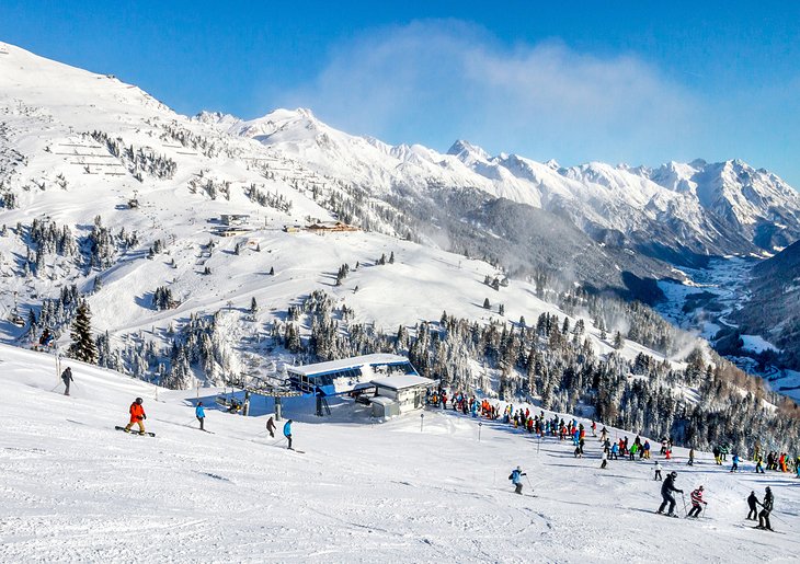 Skiers and snowboarders at St. Anton