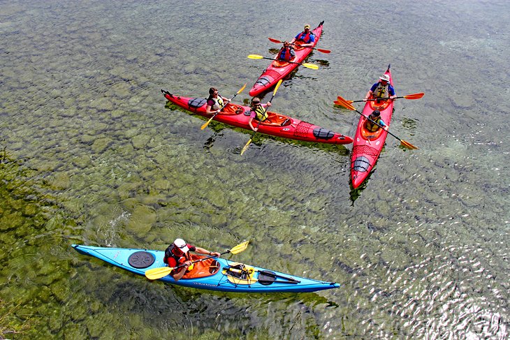 Kayaking the clear waters near Gills Rock