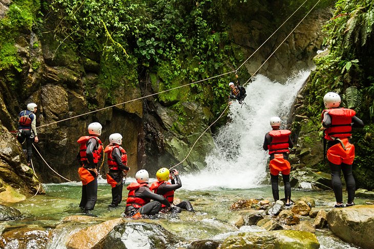 A group on a canyoning trip in Llanganates National Park near Tena