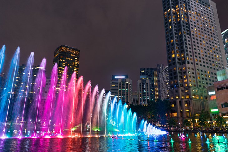 Colorful fountain at night in KLCC Park