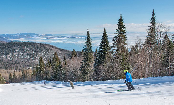 Skiing on a clear day at Le Massif