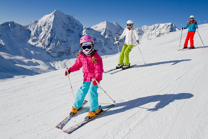Family skiing in Italy