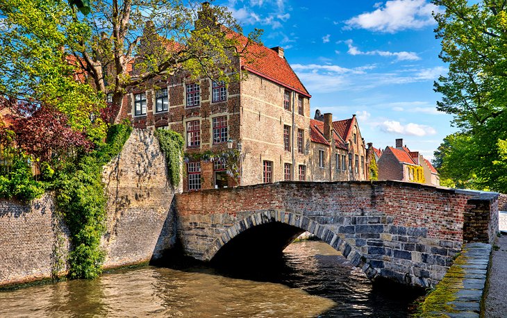 Canal and stone bridge in Bruges