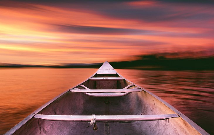 Boating on Payette Lake during sunset