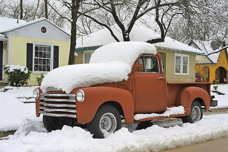 Classic truck covered in snow in Fort Worth