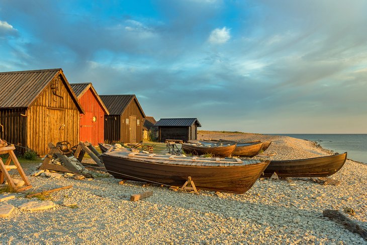 Fishing cabins and boats on the beach in Fårö