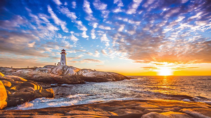 Peggy's Cove Lighthouse at sunset in Halifax
