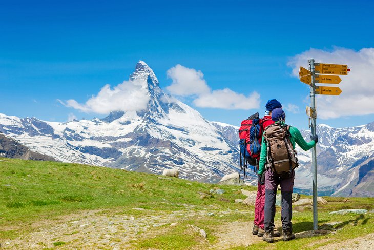 Hikers in front of the Matterhorn