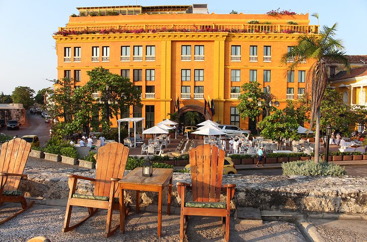 Chairs at El Baluarte restaurant and outdoor dining in behind at Charleston Santa Teresa Hotel
