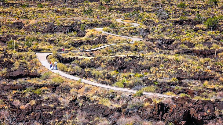 Walking through lava fields at Valley of Fires Recreation Area