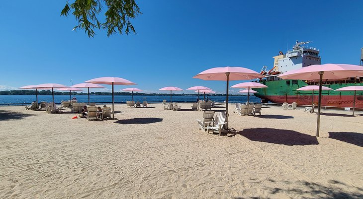 Pink umbrellas on Sugar Beach