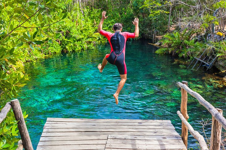 Jumping into a cenote in the Riviera Maya