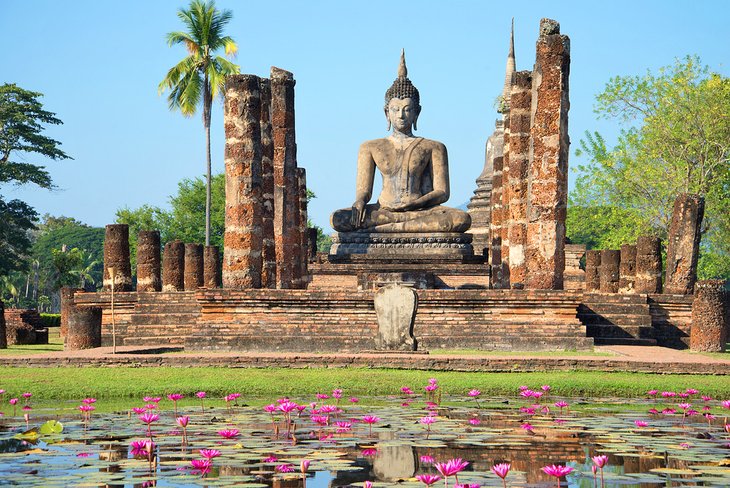 Buddha in the ruins of the temple Wat Chana Songkram, Sukhothai Old City
