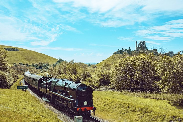 Swanage steam train next to Corfe Castle