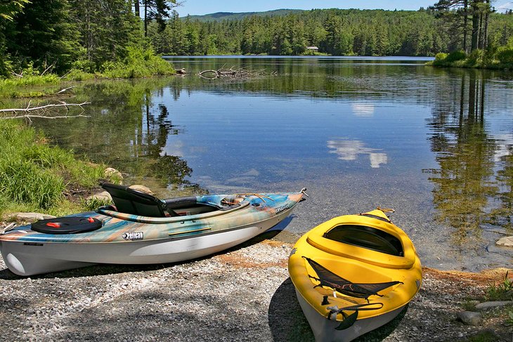 Kayaks on the shore of Lowell Lake