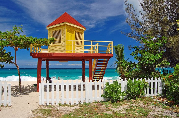 Yellow and red lifeguard booth on Grand Anse Beach