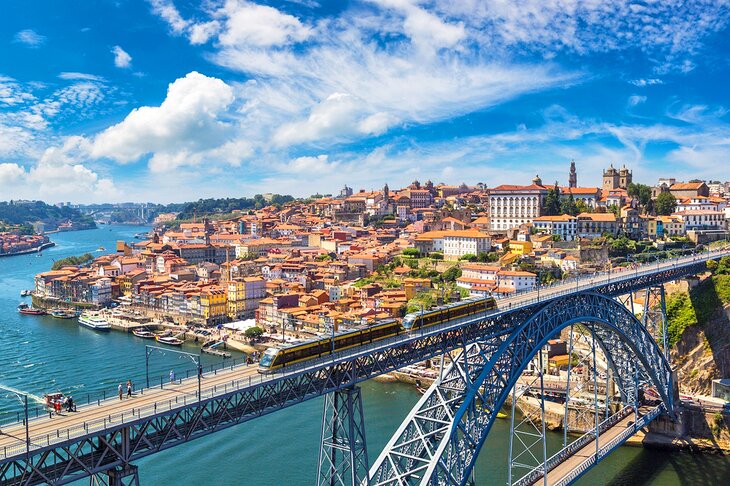 Train crossing the Dom Luis Bridge in Porto