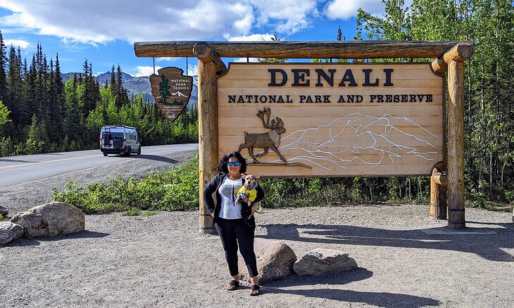 Becca and Poppy at Denali National Park and Preserve Sign