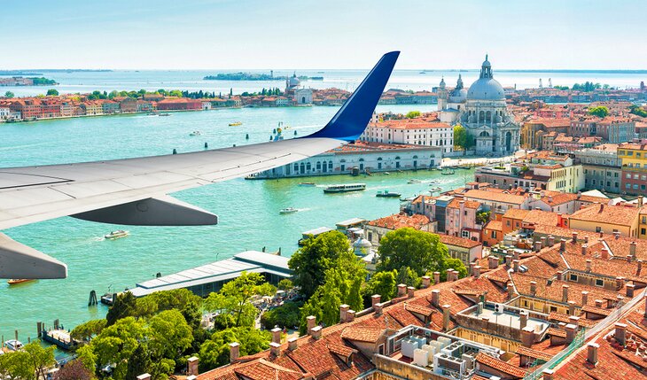 A plane flying over Venice