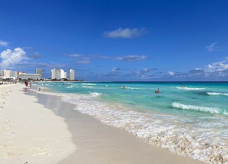 Waves rolling onto the beach in Cancun