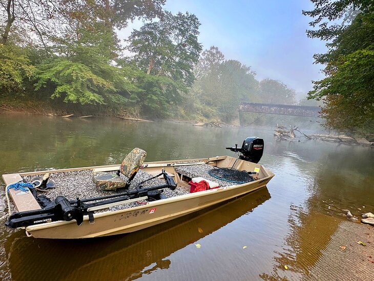 A fishing boat on the French Broad River