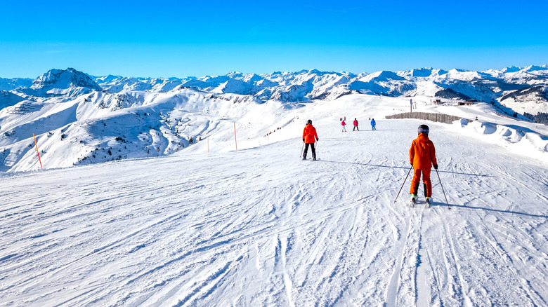 Kitzbuhel in Kitzbühel Alps region Tyrol, Austria - Skier on ski slope in ski resort in Austrian Alps