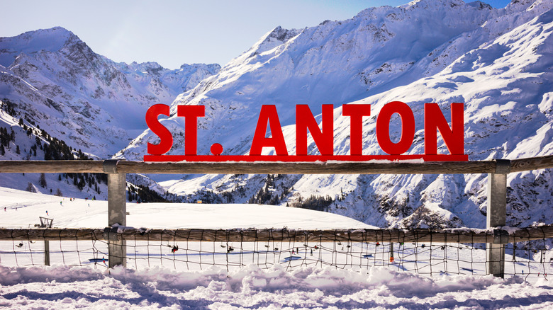 Red St. Anton photo op sign on a wood fence in the Austrian Alps near the ski resort town of St. Anton am Arlberg