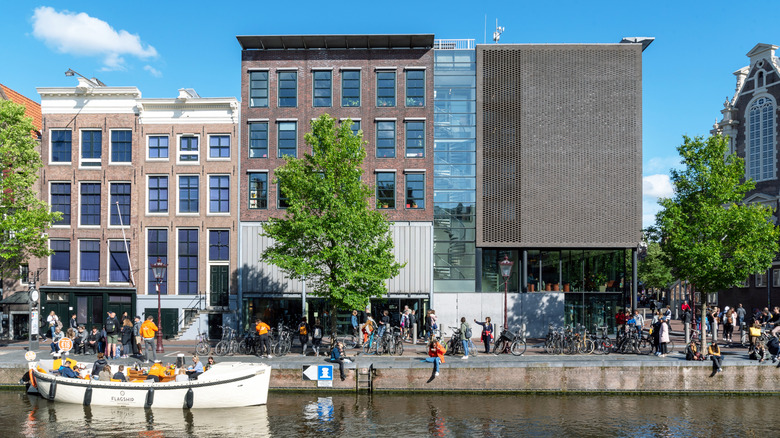View of the Anne Frank House and Anne Frank Museum from across the canal on a sunny day