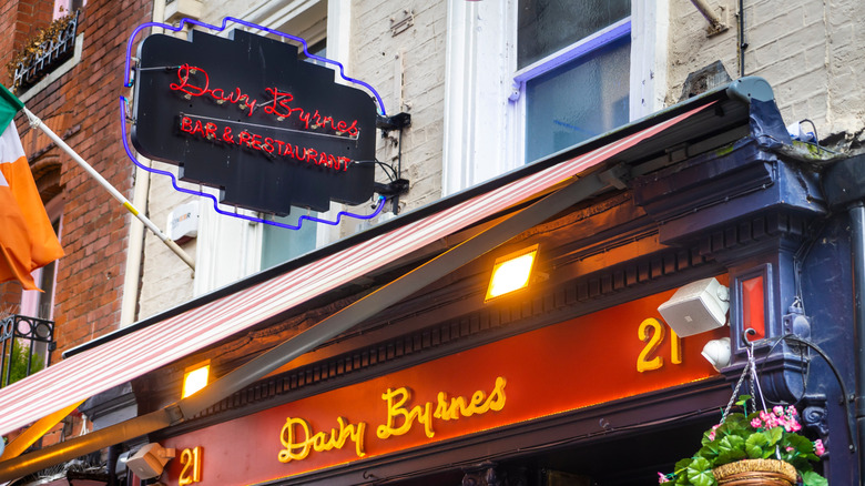 Close-up of exterior signage at Davy Brynes Bar & Restaurant in Dublin, Ireland