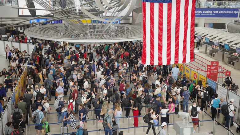 Crowded security checkpoint at New York City's JFK Airport