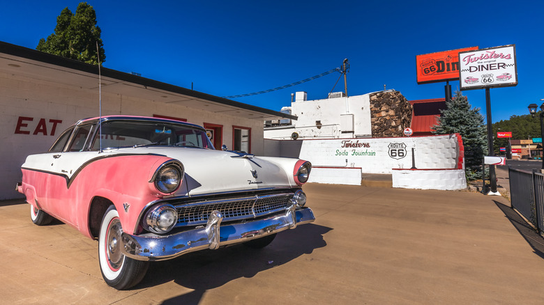 Classic car parked outside of Goldie's Route 66 Diner In Williams Located On Historic Route 66