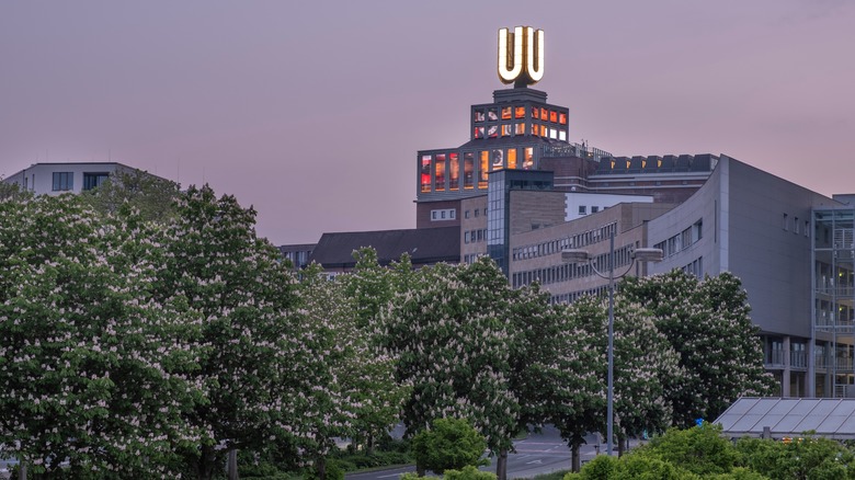The Dortmund U-Tower glowing at dusk.