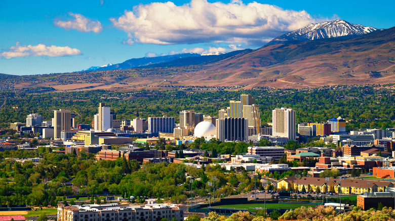 A panorama of downtown Reno with the Sierra Nevada foothills in the background