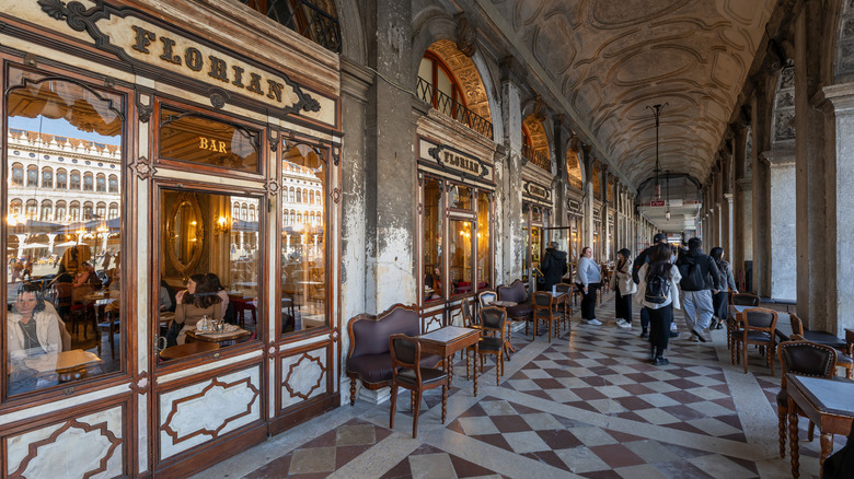 Exterior view of Caffe Florian, an 18th century historic coffee house cafe at St Mark's Square in Venice, Italy