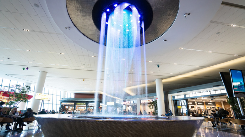 A floor-to-ceiling water feature in LaGuadia Airport