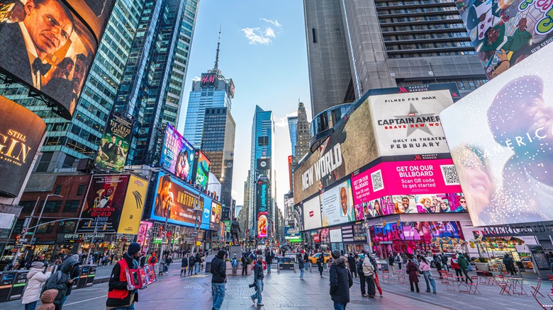 Times Square with people and billboards