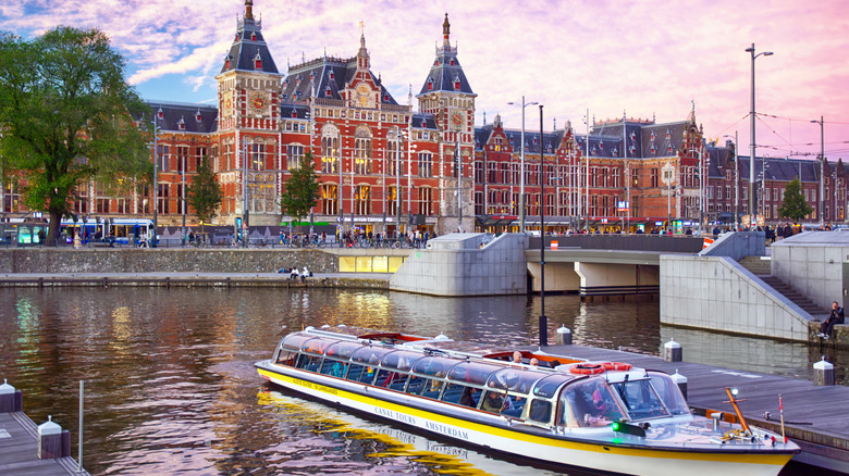 Amsterdam Centraal Railway Station views over canals and boats