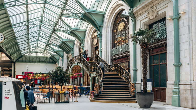 An ornate Belle Époque staircase inside of Paris Gare de Lyon station