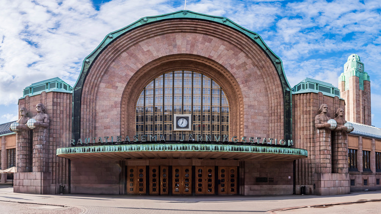 A wide-angle view of the Art Deco entrance to Helsinki Central Station